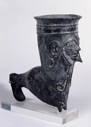 Bucchero vessel in the form of a leg with sculpted face, Etruscan period, 2nd half of 6th century BC